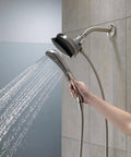 Person using Two In One Dual Shower Head With Handheld Spray In Chrome, Detachable Shower Head With Hose, versatile for full body wash.