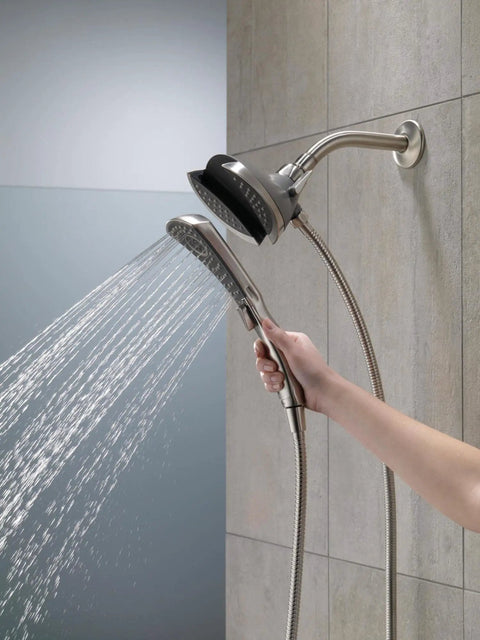 Person using Two In One Dual Shower Head With Handheld Spray In Chrome, Detachable Shower Head With Hose, versatile for full body wash.