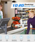 Hands Free 1D 2D Barcode Scanner With QR Reader Plug And Play For Desktop POS Systems Screen Scanning Supported Perfect For Warehouse Supermarket Retail Store And Bookstore Inventory Management in use at checkout counter with cashier and customer, showcasing scanning capability.
