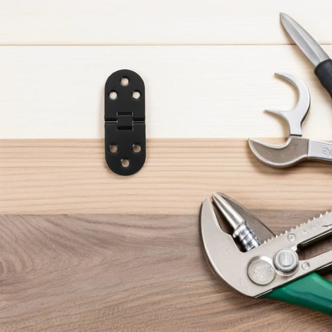 8 Piece Black Zinc Alloy Folding Table Flip Top Hinges With 180 Degree Round Edge Design on wood surface with tools