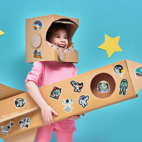 Child in cardboard rocket with Science Sticker Pack 200 Pcs For Students And Teachers Four Styles Kid Friendly Classroom Decor Decals