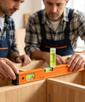 Two men using 6Pcs Small Cylindrical Bubble Level Vials 10X35Mm Pmma Mini on a wooden cabinet during DIY work.