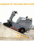 Tough As Nails Ride On Floor Sweeper With A Massive 50 Inch Sweep Path on a 35-degree incline demonstrating its capability.