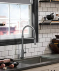 Modern kitchen with VoiceIQ Activation Module for Touch2O Kitchen Faucets Compatible with Alexa and Google Assistant voice control.