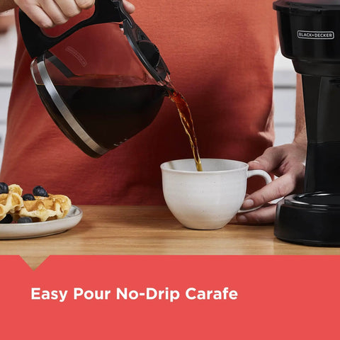 12 Cup Coffee Maker With Vortex Technology And Sneak A Cup Pause No Mess Pour Easy On Off Switch Non Drip Carafe Removable Filter Basket Delivers Rich Flavor And Clean Brew Every Time being used to pour coffee into a cup