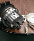 8 Inch Precision Horizontal Vertical Rotary Table With 6 Inch Three Jaw Chuck dual index plates and accessories on a table