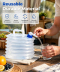 Collapsible Water Container With Spigot For Camping And Travel being used to pour water into a glass on a table.
