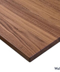 Close-up view of a walnut desktop highlighting rich wood grain for Level Up Your Home Office Setup With This Premium Dual Motor Standing Desk Featuring A Solid White Oak Desktop And Smooth Height Transitions Plus A Handy Integrated Drawer For Zero Clutter Vibes Day To Day.