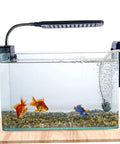 Two Pack Floating Diver Ornaments For Aquariums, Cute Underwater Decor For Fish Tanks shown with goldfish in a glass tank.