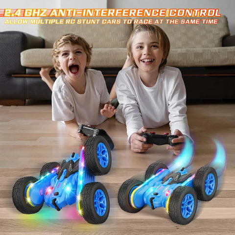 Kids playing with Lit Remote Control Drift Car With Strip Lights And Headlights 360 Degree Double Sided Rotating 4WD Stunt RC Truck For Boys And Girls Blue Best Birthday Gift For Young Adventurers, cars illuminated and in motion on floor