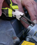 Beefy Four Piece 7 Inch Snap Ring Pliers Set in use removing retaining clips with durable steel construction and rust resistant finish