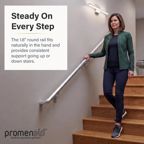 Woman using 2Ft ADA Handrail Kit For Indoor And Outdoor Stairs, 1.6 Inch Round Satin Anodized Aluminum Railing on stairs