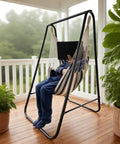 Indoor scene of weatherproof hammock chair stand with hanging swing chair included, rugged iron frame supports up to 450 lbs.