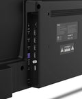 Close-up view of ports on the back of a 55 Inch QLED Smart TV With Sharp 4K Resolution And Rich HDR10 Colors Plus Slick Built In Apps.
