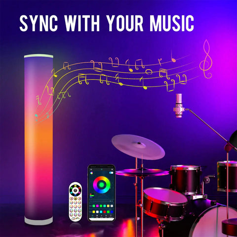 Two Pack RGB Floor Lamps With Music Sync App Control in a music-themed room with instruments and vibrant lighting display
