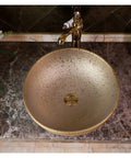 Top Shelf Hand Painted Countertop Sink With Vintage Gold Wash, heavy duty ceramic art basin above smooth countertop view.