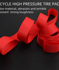 Heavy Duty Bike Rim Liner Tape For Tubes And Rims Tough As Nails Puncture Protection Red Rim Tape coiled on black background