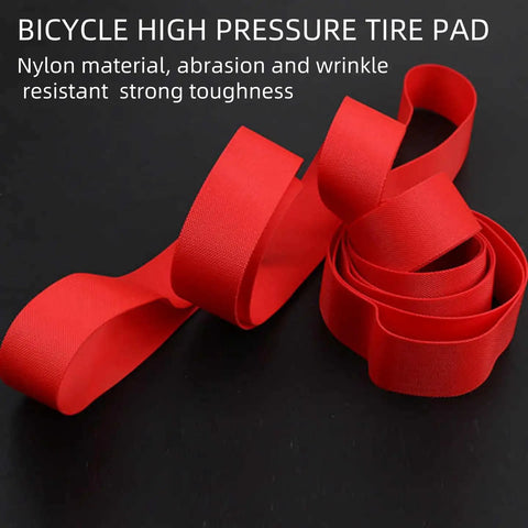 Heavy Duty Bike Rim Liner Tape For Tubes And Rims Tough As Nails Puncture Protection Red Rim Tape coiled on black background