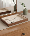 Slick Walnut Wood Jewelry Display Tray With Dope 24 Compartments For Rings Earrings Necklaces on dresser with jewelry.