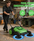 42 Inch Walk Behind Manual Floor Sweeper With 15 Gallon Waste Container And Wide Side Brushes For Garage Warehouse Yard Cleanup Heavy Duty Human Powered Build So You Can Sweep Floors With Zero Sweat Daily being used in a warehouse.