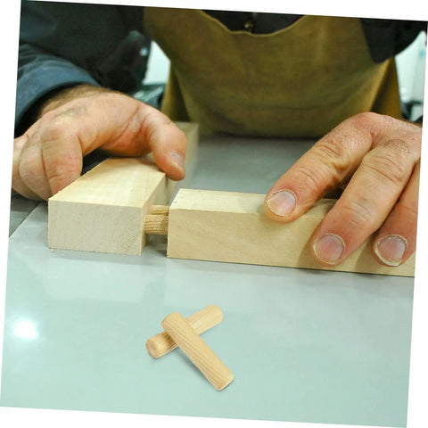 Wood Dowel Pin Kit 500 Pcs Fluted Beveled Hardwood Connectors used in furniture assembly hands aligning wood pieces