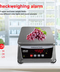Waterproof Digital Kitchen Scale With Large Stainless Steel Pan, 66 Lb Capacity displaying grapes, ideal for accurate weigh-ins.