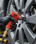 Mechanic using Heavy-Duty 19-Piece One-Half Inch Drive SAE Impact Socket Set to remove wheel lug nuts.