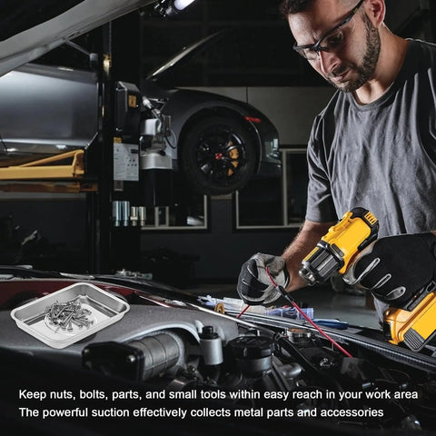 Mechanic using Heavy Duty Magnetic Tray Set For Tools And Fasteners in garage, holding power drill near car engine with stainless steel trays.