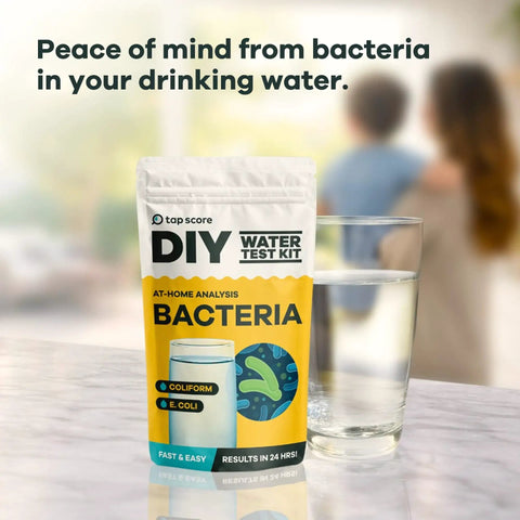 No Sweat At Home Bacteria Water Test Kit For Safe Drinking Water Screening with a glass of water in background.