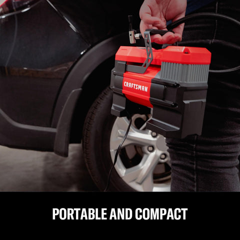 Person holding 12V Tire Inflator Portable Air Compressor With Digital Gauge Auto Shut Off LED Light 12V Car Plug near car tire