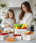 Mother and daughter using Fridge Fruit Storage Set With Removable Colander And All-In-One Washing Bowl For Rinse, Drain, And Refrigerate Produce Like A Pro, Pro-Grade Convenience, Microwave And Dishwasher Safe, Great For Salad, Berries, Lettuce, And More.