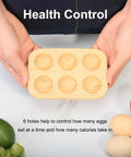 Organic Bamboo Deviled Egg Platter featuring six secure grid wells held by hands on countertop for portion control and fridge storage.