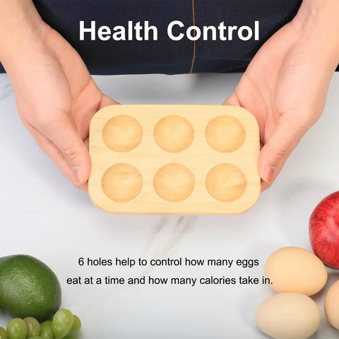 Organic Bamboo Deviled Egg Platter featuring six secure grid wells held by hands on countertop for portion control and fridge storage.
