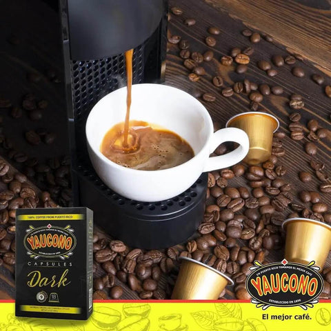 Your Go To Dark Roast Espresso Capsules 18 Count Pack Compatible With Nespresso Machines 100 Percent Puerto Rican Coffee Resealable Box Smooth Balanced Full Bodied Bold Flavor with coffee machine brewing espresso into white cup surrounded by coffee beans and capsule box