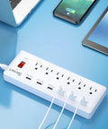 Six Outlet Surge Protector Power Strip With Six USB Ports And Six Foot Heavy Duty Extension Cord in use on desk with devices