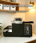 Top Shelf Electric Coffee Bean Roaster With Smooth Drum Rotation And No Sweat Temp Control Featuring Smart Timer And Built In Thermometer To Roast Nuts And Spices For Your Chill Home Brewing Setup placed on a counter with a plant.