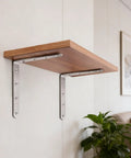 Five by five inch stainless steel L brackets supporting a wooden shelf, part of Level Up Your Home Repair Game With These Eight Pack Five By Five Inch Stainless Steel L Brackets Heavy Duty Right Angle Furniture Supports Come Decked Out With Screws For Quick Cabinet And Shelf Install.