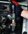 Mechanic using Pro Grade Battery Hydrometer Tester With Floating Disc Specific Gravity Readout For Cars And Golf Carts 16.25 Inch Auto Battery Tester Easy To Read State Of Charge Gauge For Quick Battery Maintenance in a car engine bay.