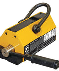 Badass Rare Earth Magnetic Lifter With Gnarly Grip For Flat Steel Plates Or Round Pipe Up To One Six Zero Zero Lbs on a workbench.