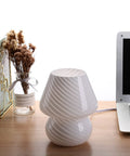 Mushroom Glass Table Lamp With White Stripe on desk, Vintage Murano Inspired Night Light, ambient warm white LED, cozy decor.