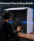 Game Changing Portable Vocal Booth With Heavy Duty Acoustic Foam For Podcasters in use at a desk recording vocals.