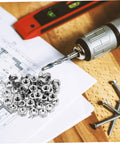 200 Piece Stainless Steel Hex Nuts Heavy Duty Hardware Fasteners on blueprints with a drill and screws, ideal for assembly and repair.