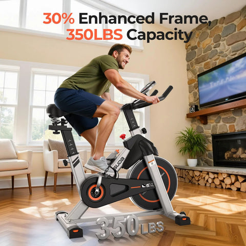 Side view of YOSUDA magnetic indoor exercise bike in a home living room; grey frame with tablet holder.