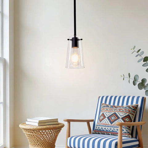 BESTWEST 3 Pack Pendant Lights Kitchen Island, clear glass pendant light hanging with matte black finish in a cozy interior.