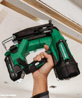 Person holding nailer, not included with Galvanized 16 Gauge Finish Nails For Straight Nailers One And Three Quarters Inch 2,500 Count Box Built To Last Workhorse Quality For Trim Cabinets And Framing