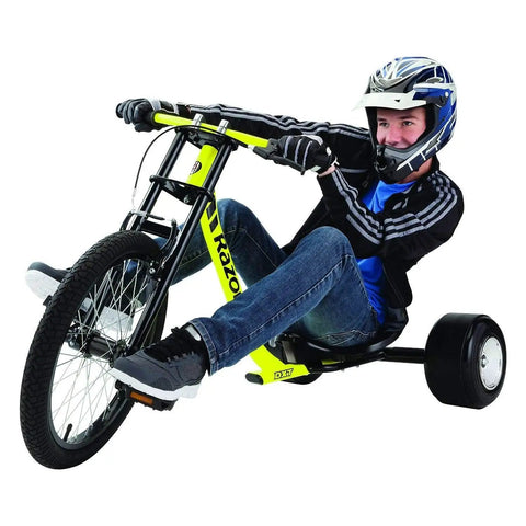 Person riding DXT Drift Trike Yellow One Size For Downhill Drifting With A Steel Frame Front Freewheel BMX Style Super Slider POM