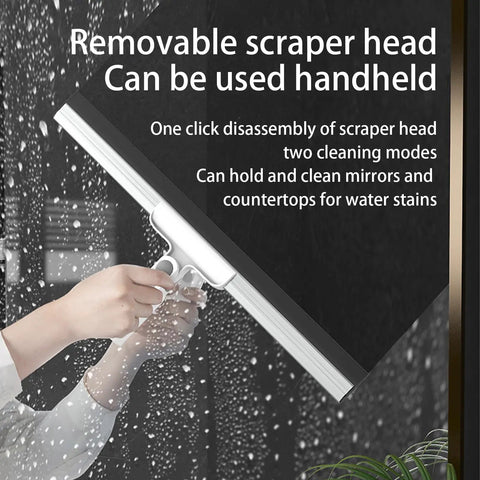 Heavy Duty Floor Squeegee With Flexible Silicone Blade And Long Aluminum Handle For Streak Free Bathrooms Showers Tiles Driveways And Glass That Makes Mopping Obsolete Now being used on a wet glass surface.