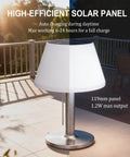 Solar Powered Outdoor Table Lamp With 3 Way Dimmable LED shown on a patio with pull chain detail, lit under sunlight