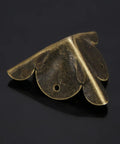 Solid Antique Bronze Corner Protectors - Detailed view of a single corner bracket made from solid plated iron.