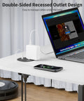 Dual Sided Desk Grommet Power Strip With Four AC Outlets And Three USB Ports Including Two Type C Connectors creating a clean workspace upgrade with a recessed outlet design.